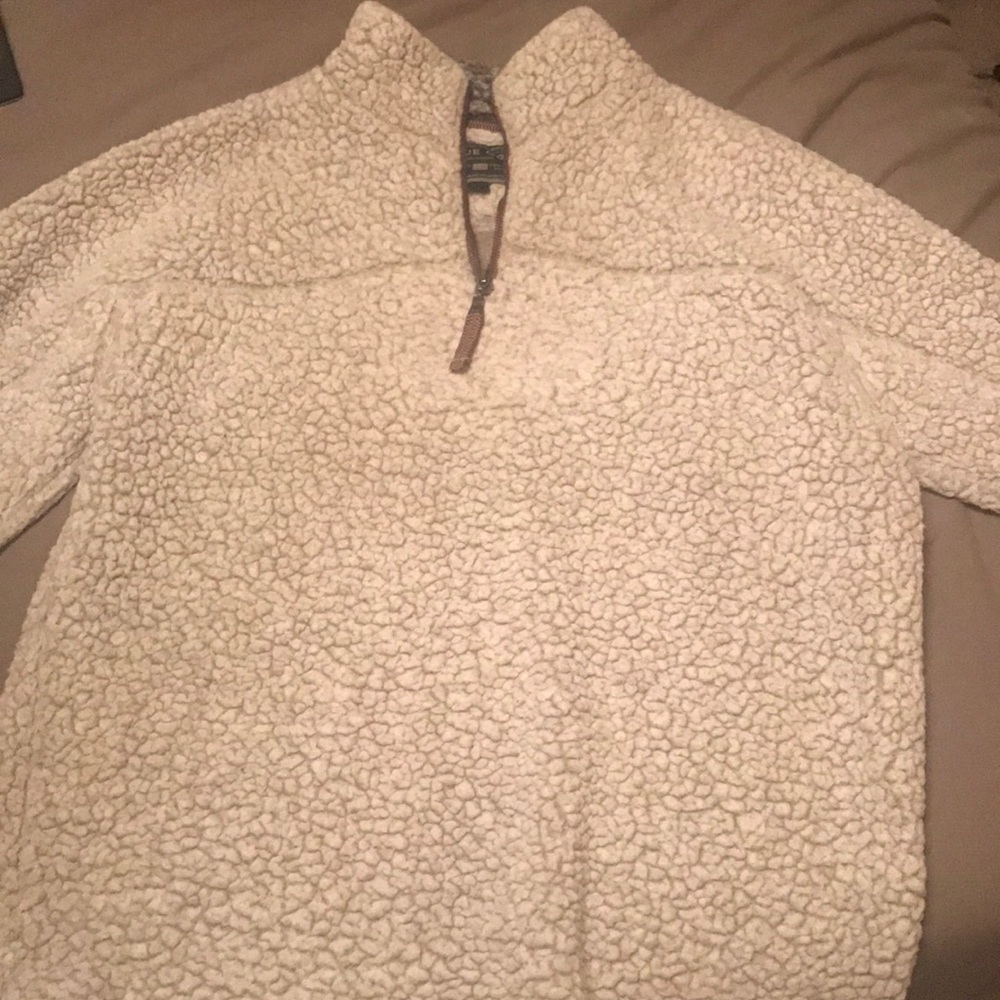 large cream colored true grit pullover